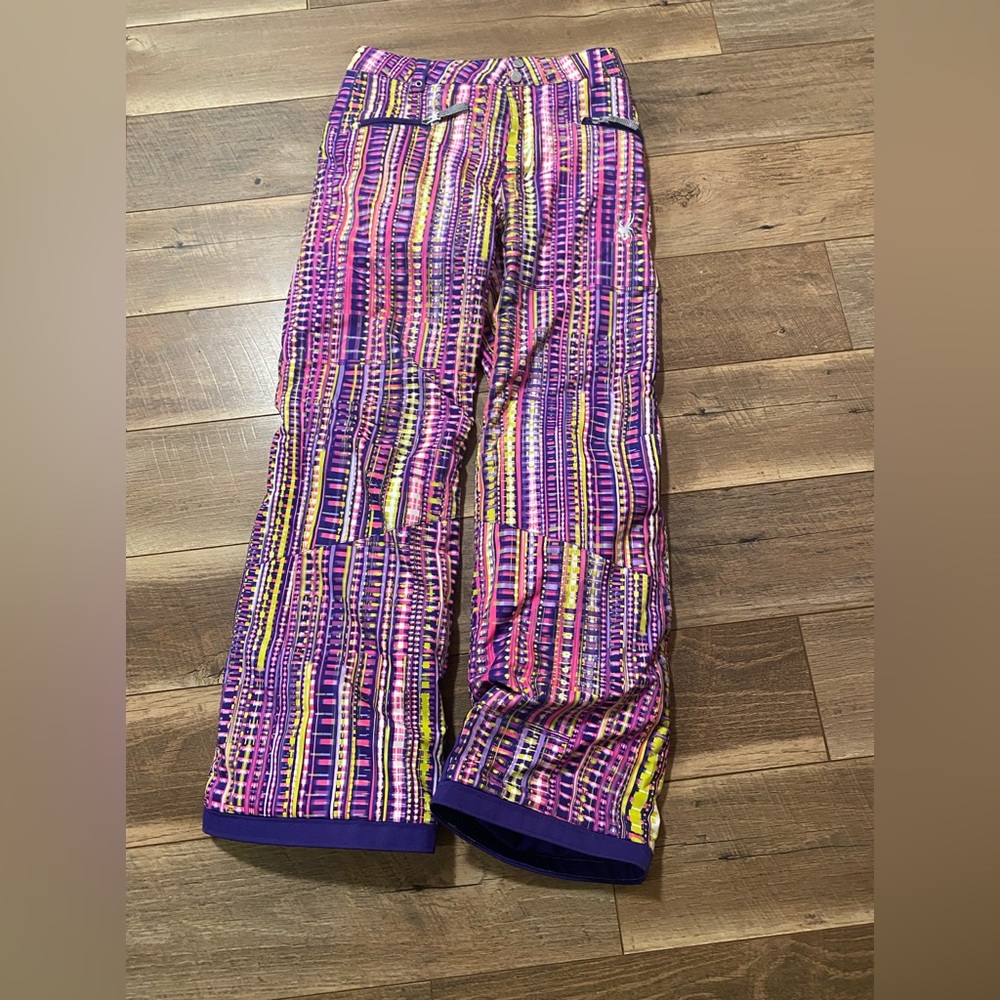 Spider ski pants with tags. Excellent condition. Junior size 16.